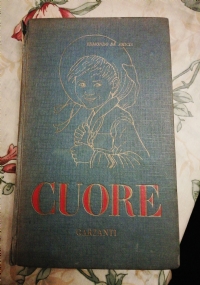 � gradito l�abito scuro di 