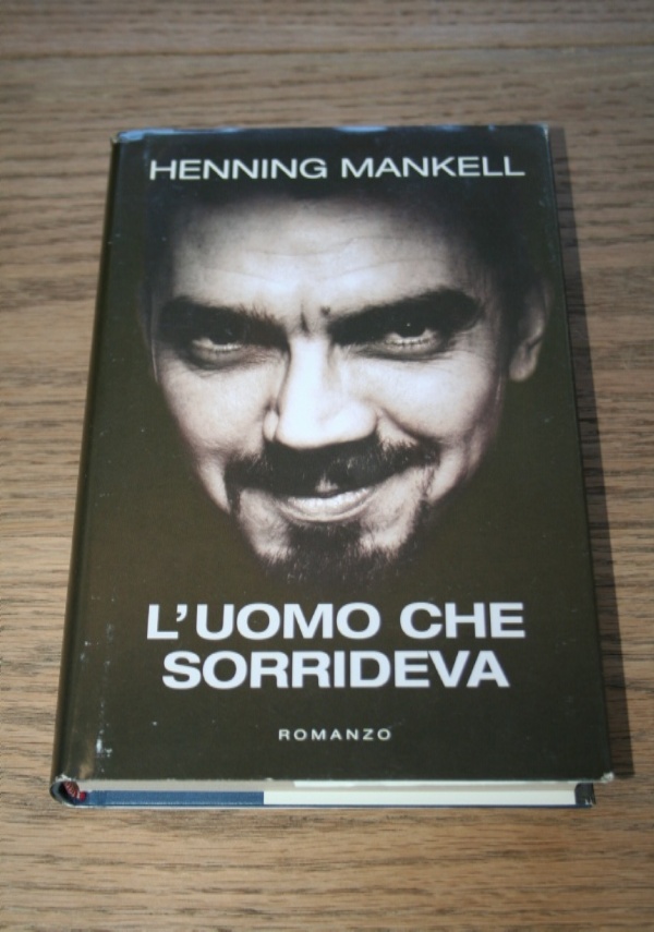 HENNING MANKELL L&rsquo;UOMO CHE SORRIDEVA MONDOLIBRI 2004 COPERTINA RIGIDA di HENNING MANKELL